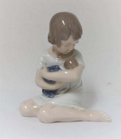 Royal Copenhagen. Porcelain figure. Girl. Model 1938. Height 12.5 cm. (1 
quality)