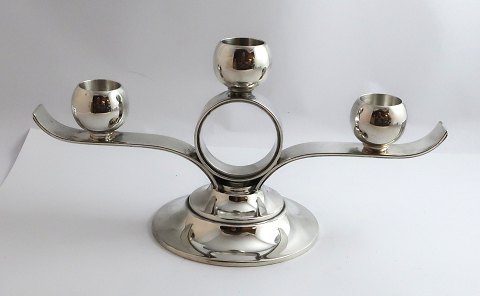 C. F. Heise. Sterling (925). 3-arm candlestick. Height 12.5 cm. Length 25 cm. 
Produced 1938.