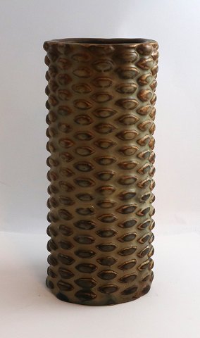 Royal Copenhagen. Aksel Salto. Cylindrical stoneware vase with knobbed style. 
Height 21 cm.