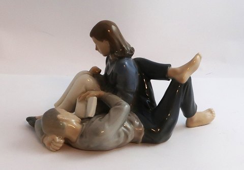 Royal Copenhagen. Porcelain figure. Young pair. Model 4649. Length 19 cm. (2 
quality)