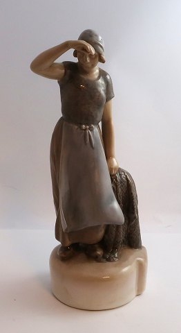 Bing & Gröndahl. Porcelain figure. Woman with fishing net. Model 2036. Height 26 
cm. (1 quality)