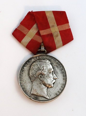 Medal for the rescue of drowning people. Christian X. Engraved name unclear.