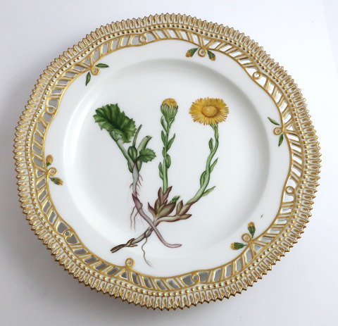 Royal Copenhagen Flora Danica. Lunch plate with open-work border. Design # 3554. 
Diameter 23 cm. (1 quality). Tussilago farfara L
