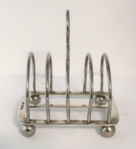 Elkington. English toast holder in sterling silver (925). Length 12 cm. Height 13.5 cm. Produced Birmingham 1907.