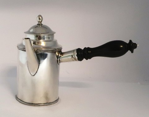 Jug. Silver (830) . Stamped (P.F) Pierre Frontin. Born in 1758 and died 1837. Produced Copenhagen 179?. Born of French parents of Hugenot family, moving to France in 1764, and does his masterpiece in Paris. Get citizenship in Copenhagen 1788. Height 16 cm