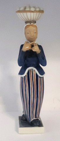 Royal Copenhagen. Porcelain figure. The woman with the eggs. Model 4844. Height 31 cm. (1 quality)