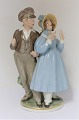 Royal Copenhagen. Porcelænsfigur. Hans & Trine med farver. Model 1783. Højde 24 
cm. (1 sortering)