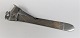 Axel Holm. Cigar cutter with silver (830). Length 16 cm