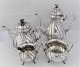 P. Hertz. Silver coffee-tea service (830). Consisting of; Coffee pot, tea pot, 
creamer and sugar bowl. Height of the coffee pot is 21 cm.