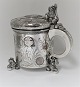 Silver mug with inlaid coins (830). Height 19.5 cm.