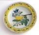 Kellinghusen plate, faience. Deep plate with bird motif. Diameter 23 cm. With 
repair.