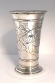 K. Tömmerup, Copenhagen (K.T.). Silver vase with floral motif (830). Height 18.5 
cm. Produced 1906.