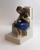 Bing & Gröndahl. Porcelain figure.The little girl with the matches. Model 1655. 
Height 14 cm. (1 quality).