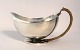 Georg Jensen. Sauce bowl with handle. Harald Nielsen. Model 761. Length 17 cm. 
Height 7.5 cm. Produced 1933 - 1945