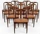 8 Fantastic Johannes Andersen chairs in solid rosewood. Produced by Uldum Møbler (Label). Upholstered with newer Cognac Colored Leather.Delivery Jutland/Funen 500kr (within 30 days)Zealand 300kr (Weekly)