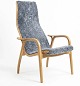 lamino Armchair in oak by Yngve Ekstrøm covered with beautiful lambskin.Delivery:Jutland/Funen 500kr (monthly)Zealand 300kr (weekly)
